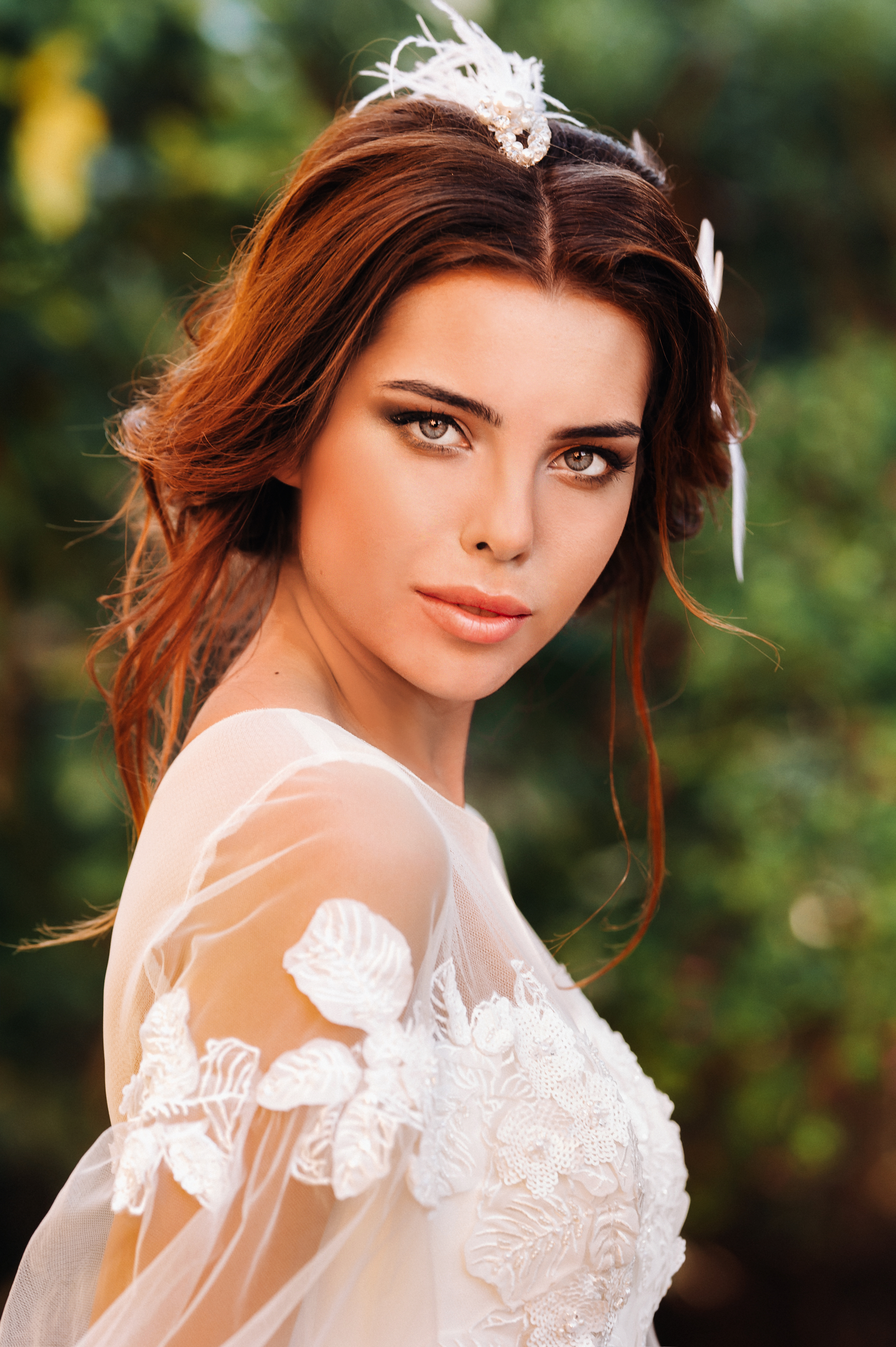 Stylish young bride on her wedding day in Italy.elegant Bride from Tuscany.Bride in a white wedding